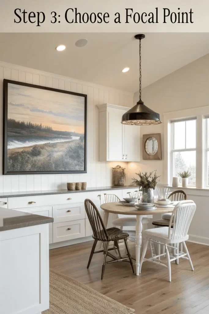 Modern kitchen with a focal point wall above the dining table, featuring a large framed artwork and pendant lights, designed to highlight the main area of kitchen wall decor.